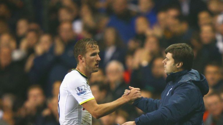 Harry Kane of Spurs shakes hands with Manager Mauricio Pochettino of Spurs during the Capital One Cup Fourth Round match