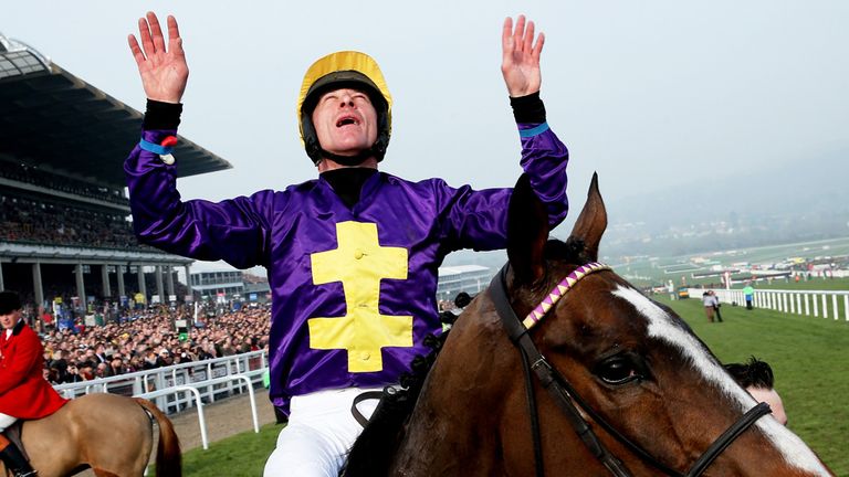 Davy Russell celebrates after riding Lord Windermere to victory in the Gold Cup