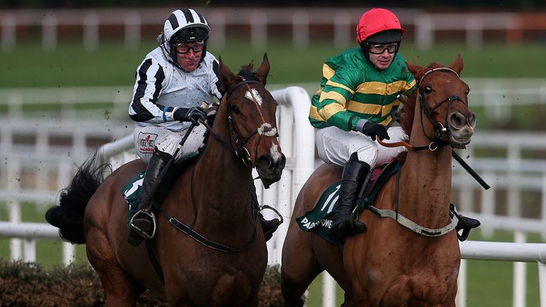 Shantou Ed (right), ridden by Alan Crowe, races ahead of Rock the World ridden, by Robbie Power, on the way to winning Paddy Power Games Handicap Hurdle 