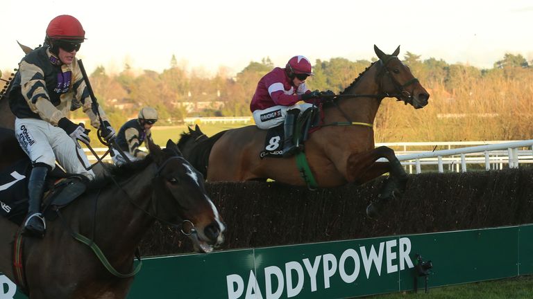 Road To Riches ridden by Bryan Cooper jumps the last on his way to winning the Lexus Chase at Leopardstown