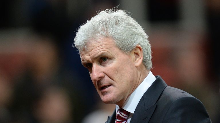 Stoke City's Mark Hughes leaves after the English Premier League match between Stoke City and Chelsea 