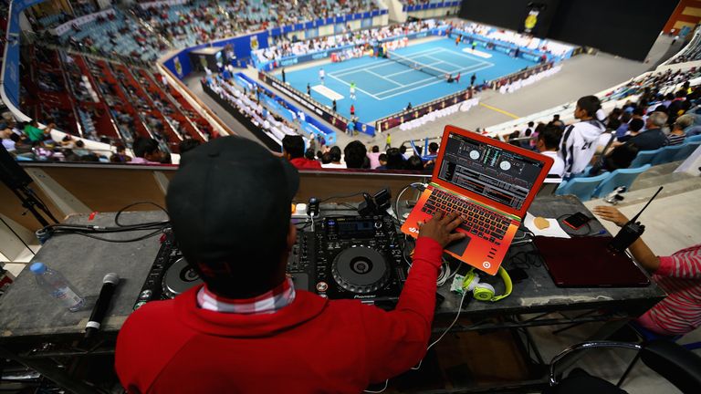 DUBAI, UNITED ARAB EMIRATES - DECEMBER 12:  The IPTL DJ in action during the match between the Manila Mavericks and the Indian Aces during the Coca-Cola In