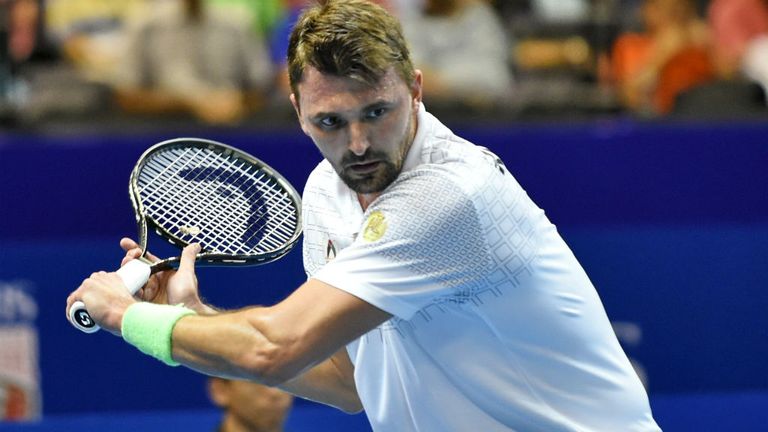 Croatia's Goran Ivanisevic of the UAE Royals play against Australia's Mark Philippoussis of the Manila Mavericks
