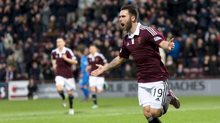 Hearts' James Keatings celebrates after scoring his side's opening goal against Queen of the South
