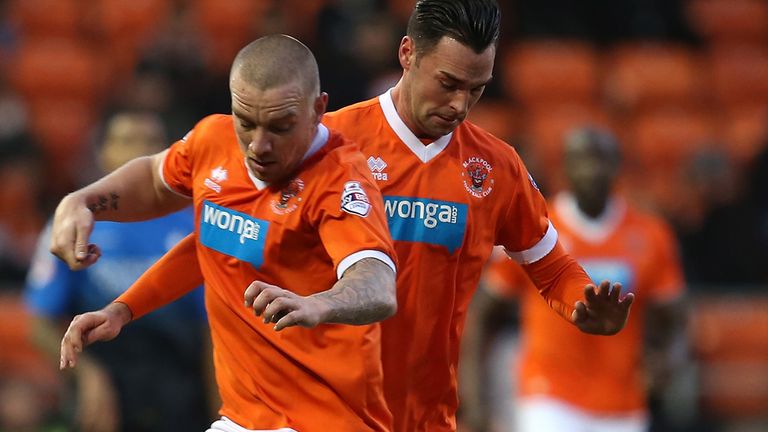 BLACKPOOL, ENGLAND - DECEMBER 20:  Chris Eagles and team mate Jamie OHara of Blackpool collide during the Sky Bet Championship match between Blackpool and 