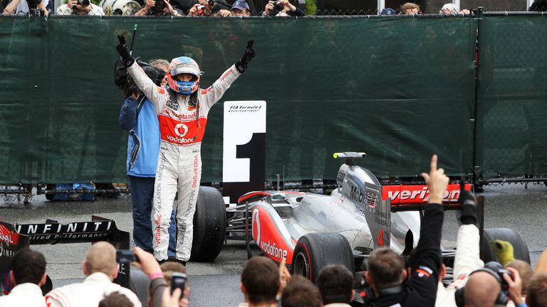 Jenson Button celebrates his Canadian win