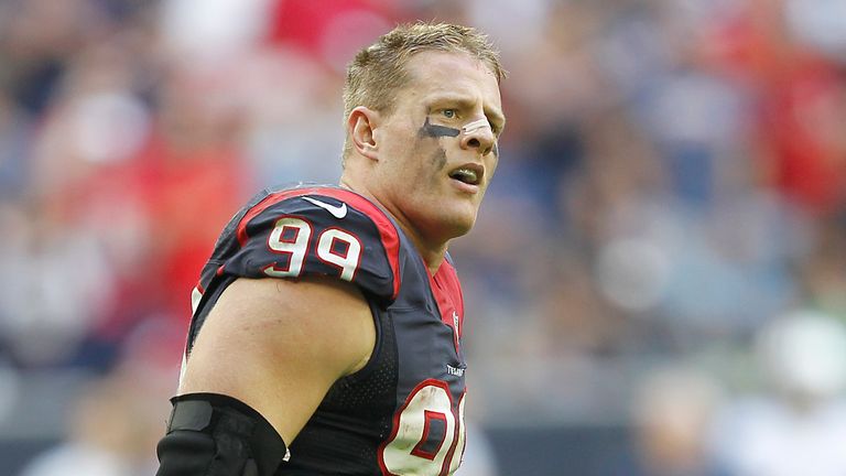 J.J. Watt #99 of the Houston Texans celebrates his touchdown against the Tennessee Titans in the fourth quarter in a NFL game on