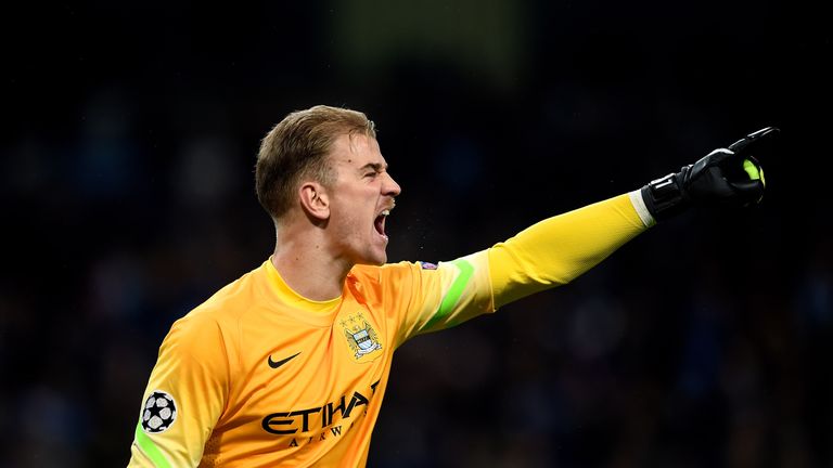 Goalkeeper Joe Hart of Manchester City directs his defence during the UEFA Champions League 