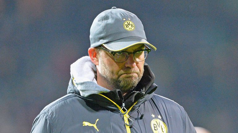 BREMEN, GERMANY - DECEMBER 20:  Juergen Klopp, head coach of Dortmund looks dejected at the end of the 