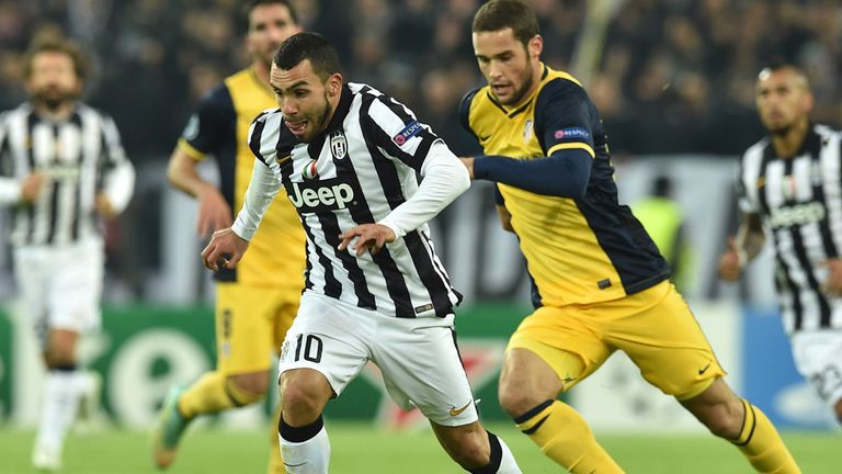 Carlos Tevez of Juventus in action during the UEFA Champions League group A match between Juventus and Club Atletico de Madrid