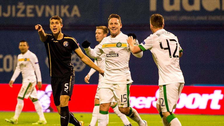 Kris Commons celebrates with Callum McGregor (right) after equilising for Celtic.
