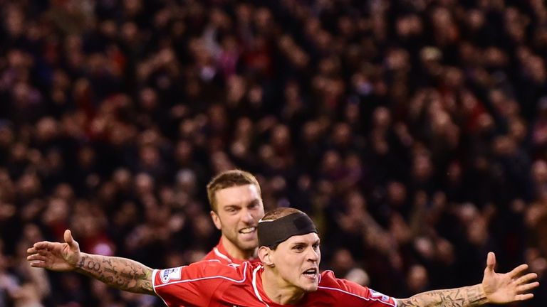 Liverpool's Slovakian defender Martin Skrtel celebrates scoring his team's second equalising goal 