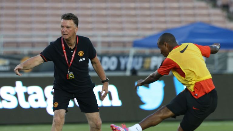 Louis van Gaal with Ashley Young of Manchester United during an open training session as part of their pre-season tour to the United States in 2014