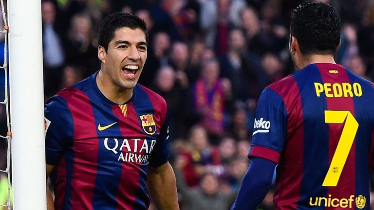 BARCELONA, SPAIN - DECEMBER 20:  Luis Suarez of FC Barcelona celebrates with his teammate Pedro Rodriguez of FC Barcelona after scoring his team's second g