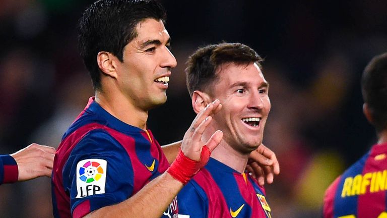 BARCELONA, SPAIN - DECEMBER 20:  Lionel Messi of FC Barcelona celebrates with his teammate Luis Suarez of FC Barcelona after scoring his team's fifth goal 