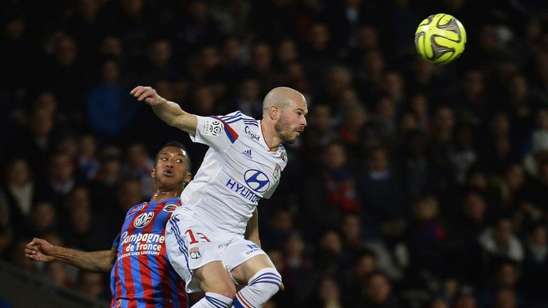 Lyon defender Christophe Jallet wins a header