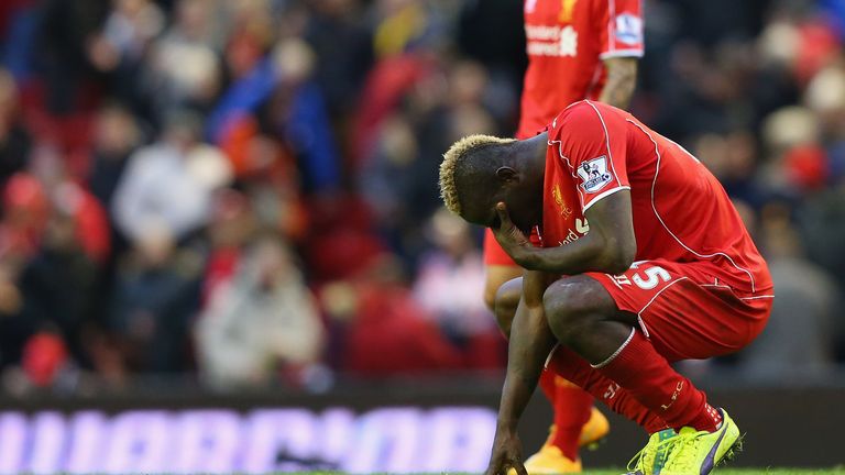 LIVERPOOL, ENGLAND - OCTOBER 25:  Mario Balotelli of Liverpool looks dejected after the Barclays Premier League match between Liverpool and Hull City at An