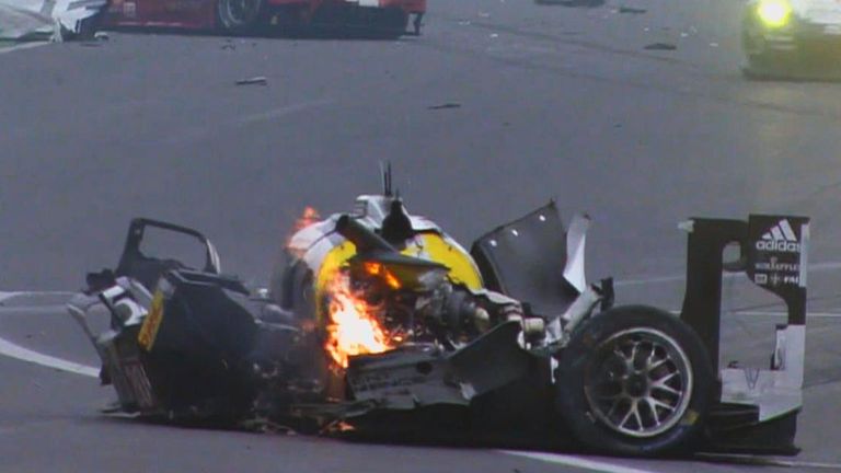 Mark Webber's Porsche catches fire after crashing at high speed