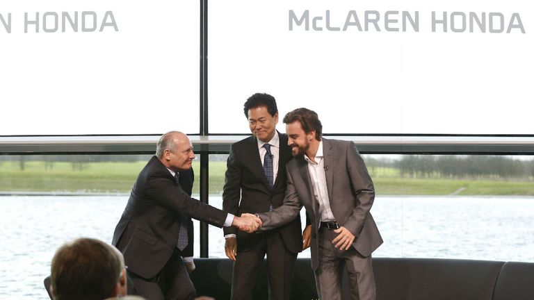 Ron Dennis welcomes Fernando Alonso onto the stage
