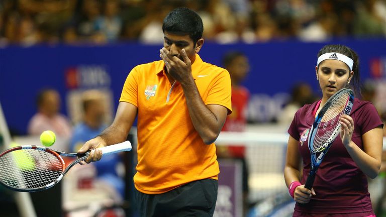 Rohan Bopanna and Sania Mirza of the Indian Aces show their dejection against Kirsten Flipkens and Daniel Nestor of the Manila Mavericks
