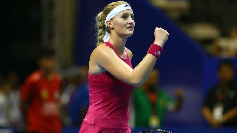 Kristina Mladenovic of the UAE Royals celebrates a point against Kirsten Flipkens of the Manila Mavericks