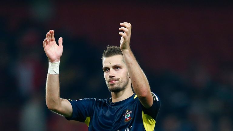 Morgan Schneiderlin of Southampton thanks the support at full time during the Capital One Cup Third Round match at Arsenal