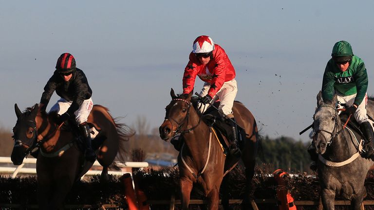 Parlour Games ridden by Noel Fehily (far left) wins The Betfred Goals Galore Challow Novices race beating second placed Vyta Du Roc (right) ridden by Barry