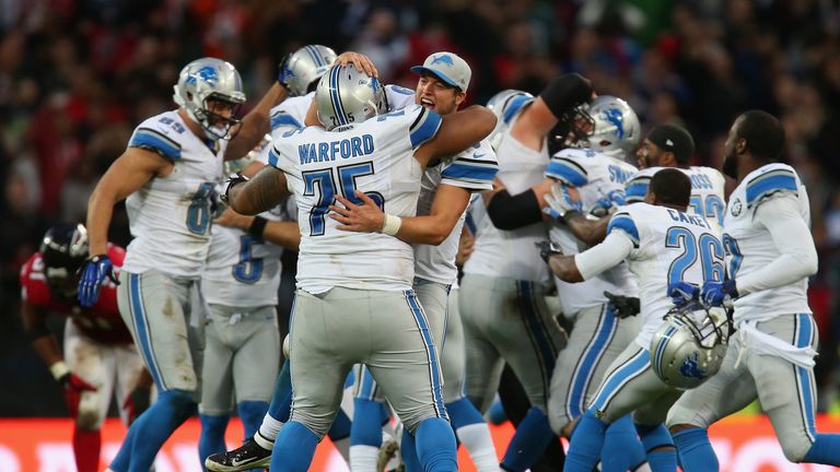 LONDON, ENGLAND - OCTOBER 26:  Matt Prater #5 of the Detroit Lions celebrates with team mates after kicking a 48 yard field to win the game during the NFL 