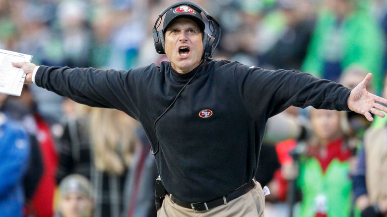 Head coach Jim Harbaugh of the San Francisco 49ers reacts during the game against the Seattle Seahawks at CenturyLink Field
