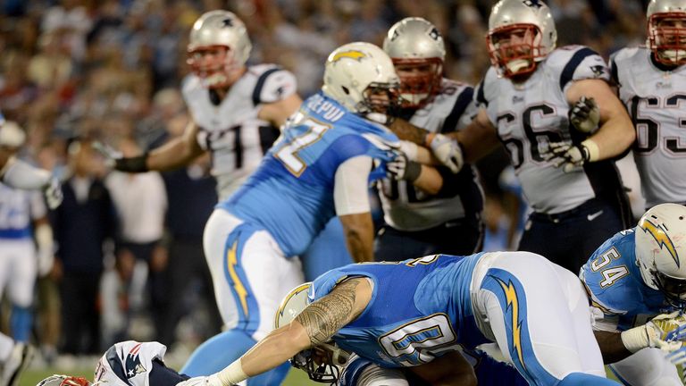 The Patriots' Tom Brady runs for a first down during victory over the Chargers. 