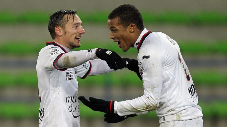 Eric Bautheac and Alassane Plea celebrate Nice's victory