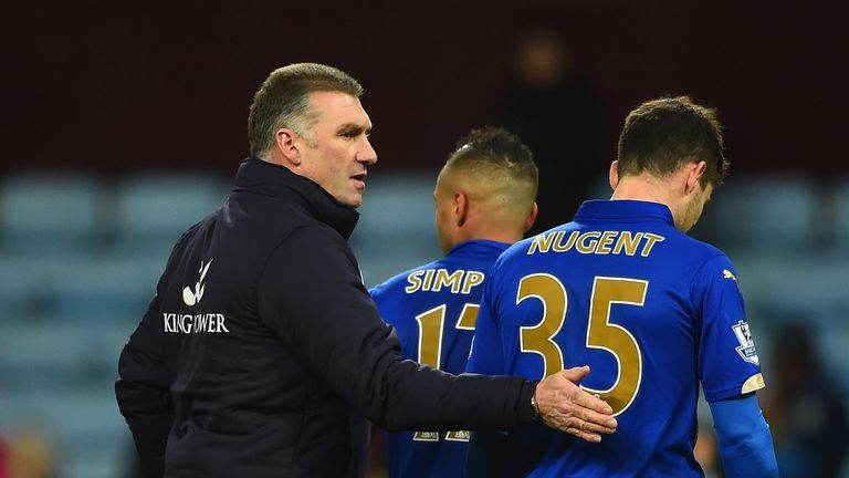 Nigel Pearson, manager of Leicester City, consoles David Nugent and Danny Simpson after 2-1 Premier League defeat at Aston Villa