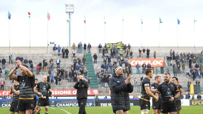 Northampton players applaud fans after win at Treviso