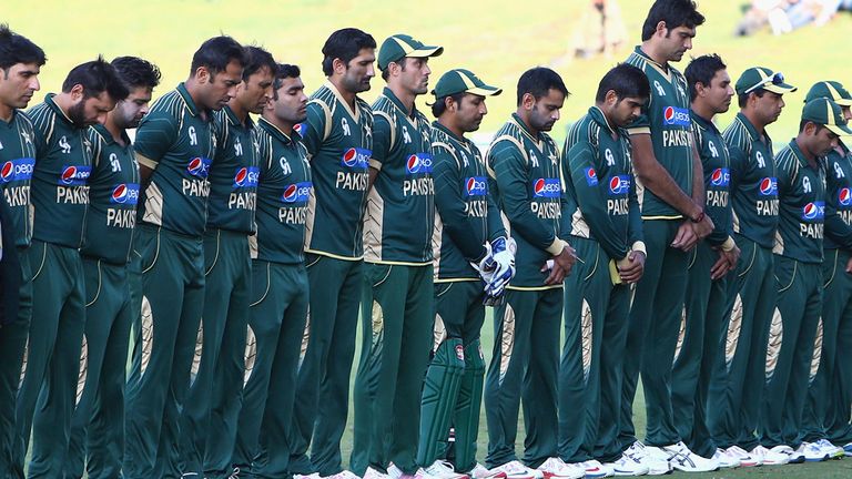 Pakistan's players observe a two-minute silence in memory of those who died in Tuesday's Peshawar school massacre