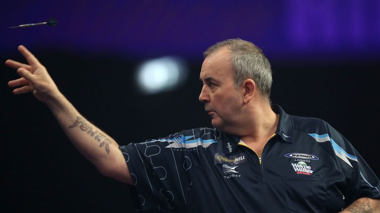 Phil Taylor during his match against Kim Huybrechts during the William Hill World Darts Championship at Alexandra Palace, London.