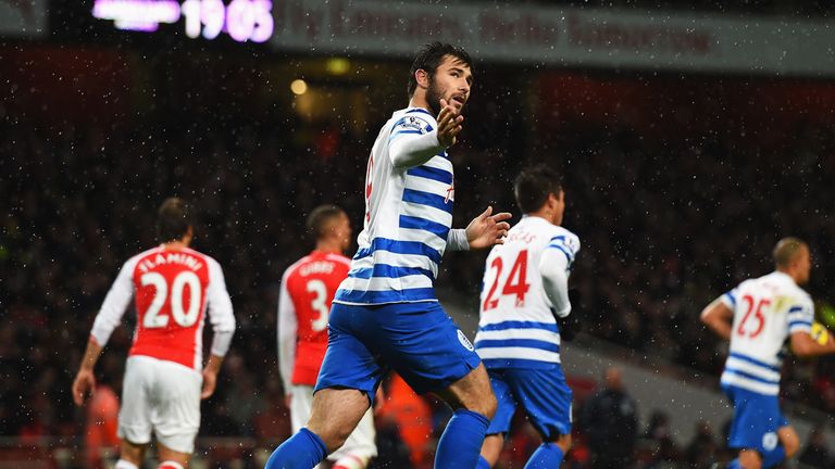 Charlie Austin of QPR celebrates scoring his penalty during the Barclays Premier League match between Arsenal and QPR