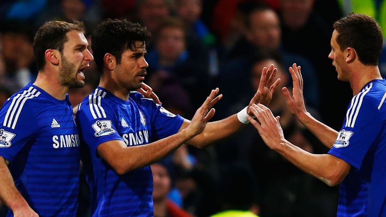 Diego Costa celebrates with Chelsea team mates 