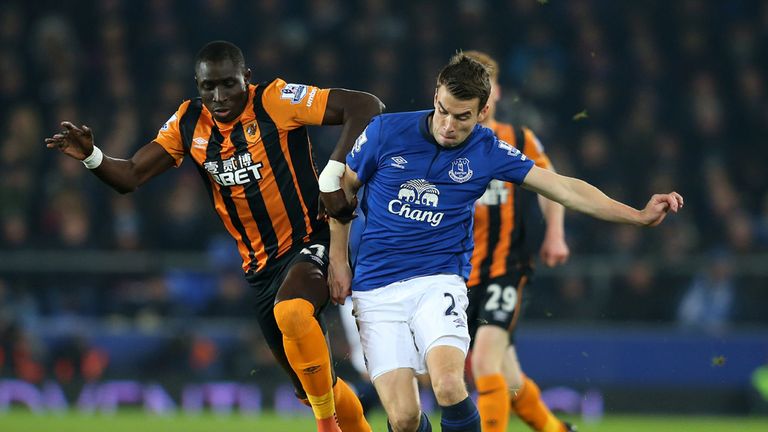 Seamus Coleman is challenged by Mohamed Diame