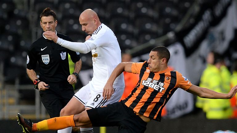 Jake Livermore tackles Jonjo Shelvey