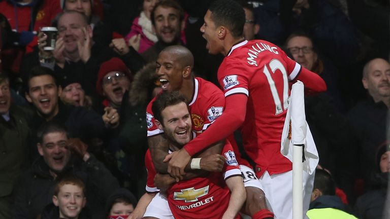 Juan Mata of Manchester United celebrates his part in their second goal against Stoke