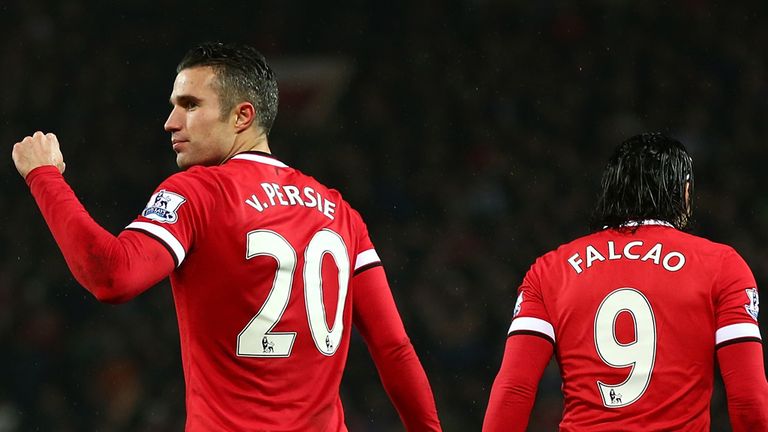 Robin van Persie of Manchester United celebrates scoring the third goal  during the Barclays Premier League match against Newcastle