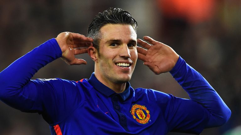  Robin van Persie of Manchester United celebrates scoring his second goal against Southampton
