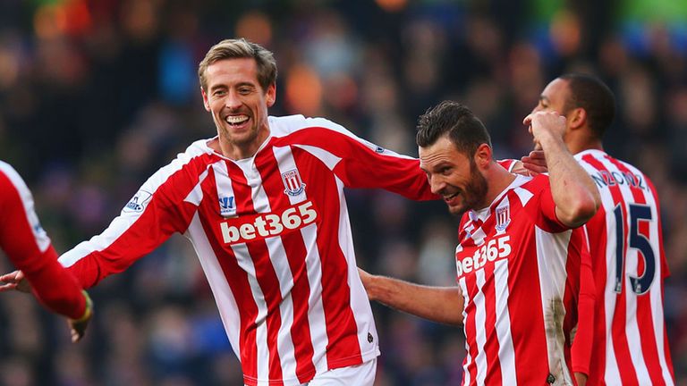 Peter Crouch of Stoke celebrates with Erik Pieters