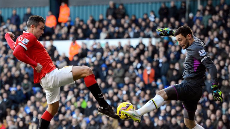 Tottenham goalkeeper Hugo Lloris saves from Robin van Persie.