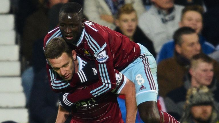Kevin Nolan celebrates with Cheikhou Kouyate after scoring for West Ham