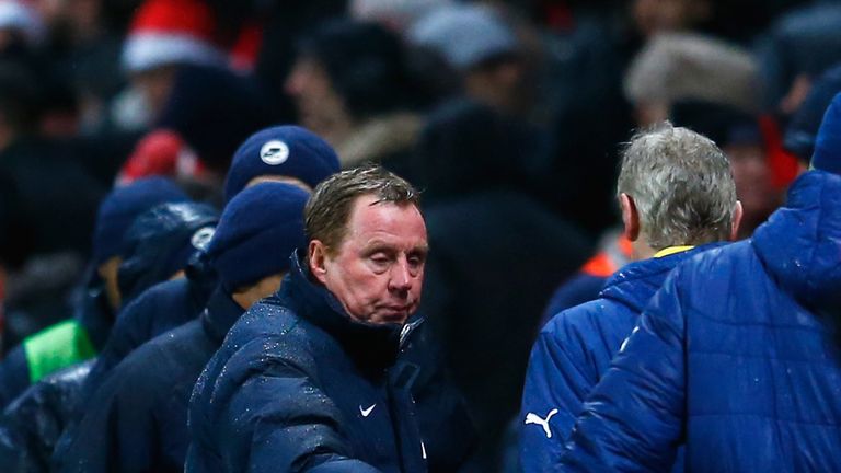 LONDON, ENGLAND - DECEMBER 26: Harry Redknapp, manager of QPR shakes hands with Arsene Wenger, manager of Arsenal after the Barclays Premier League match b