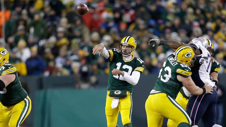 Quarterback Aaron Rodgers passes to Jordy Nelson for a 45 yard touchdown reception against the New England Patriots