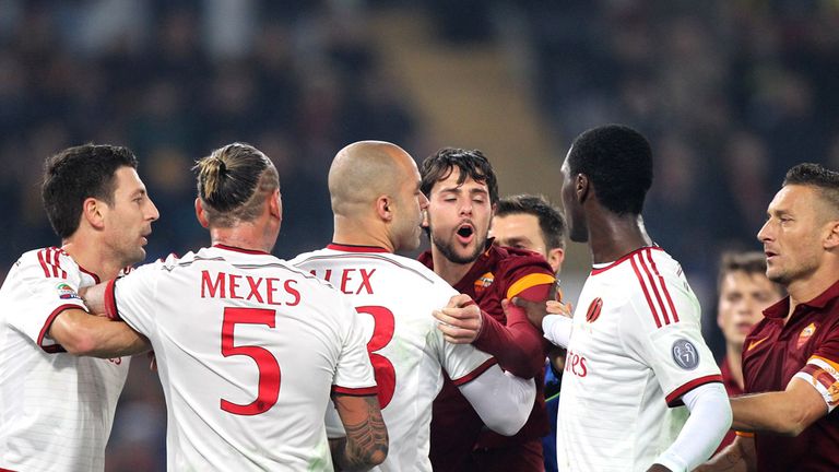 Milan and Roma players argue during their goalless draw