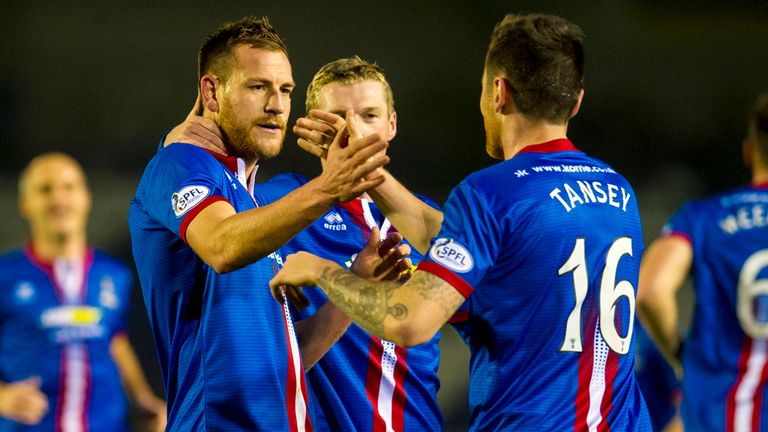 Inverness' Gary Warren celebrates with team-mates