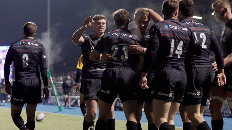 Saracens' Ben Ransom (centre) is congratulatede by team mates afterscoring a try during the European Champions Cup Pool One match at Allianz Park, London. 